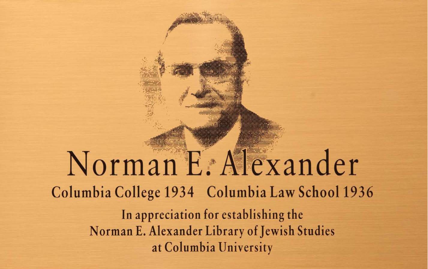 Image of a gold-colored plaque with a man on it